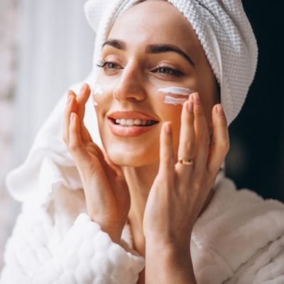 woman-applying-face-cream_1303-14311 woman-applying-face-cream_1303-14311